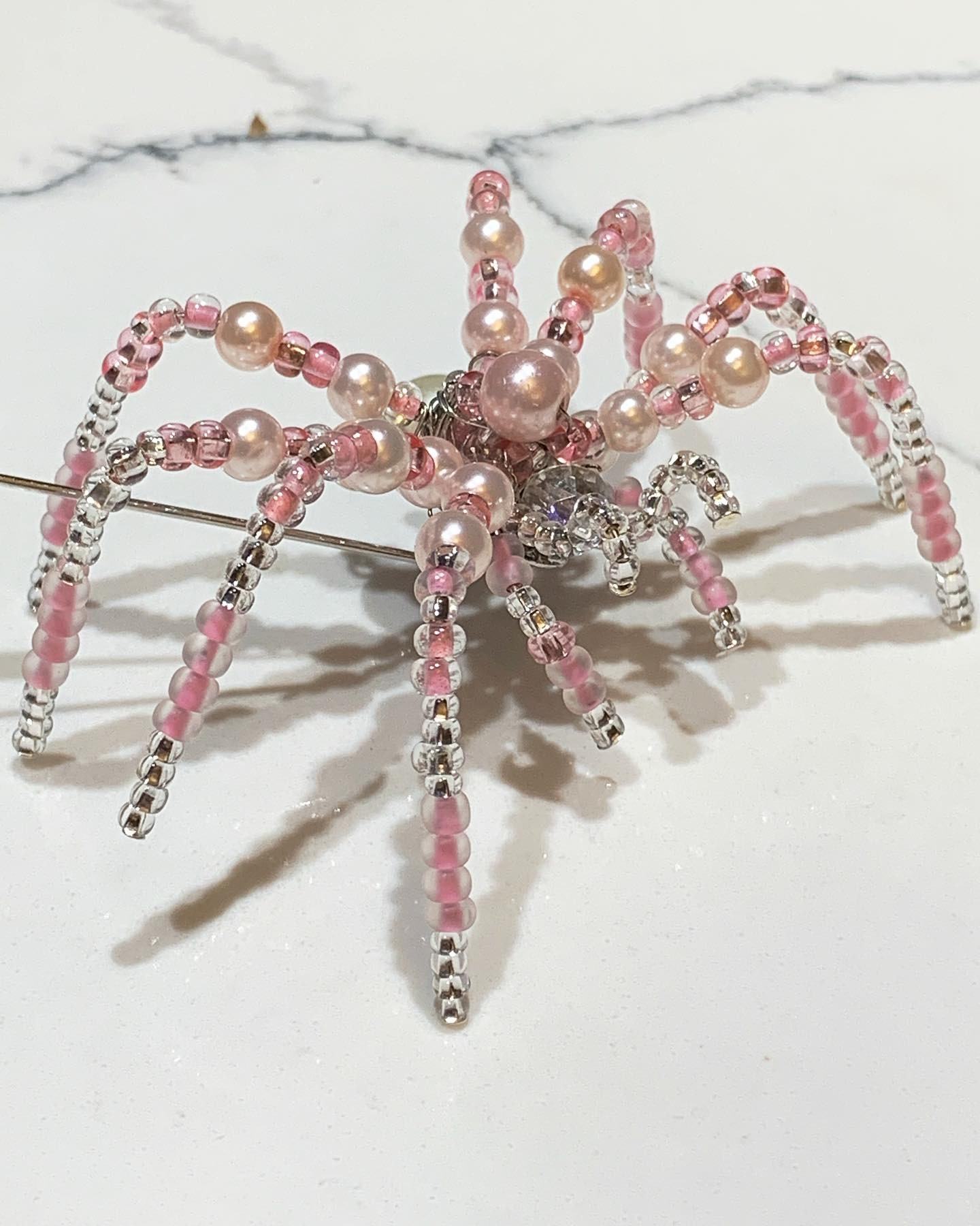 #prototypes #prototypeready #pinkcrystal #pinkspider #spiderbroach #beadandcrystals #crystalsandpearls #beadworkjewelry it just #sparkles so much it’s hard to capture it in the right light, I’ll be using the light box when I get to producing these when all my supplies arrive and I get rolling in colour and stereo! Super excited to be doing this! PM me for details if your interested! #jewellerymaking #christmasspider #easterspider and beyond! #crafting from your fave #greeneyed #dirtyblonde #glamazon #transsexualwoman #lovinglife💞 and #livingitlarge #amazonstyle 💕🖤💕